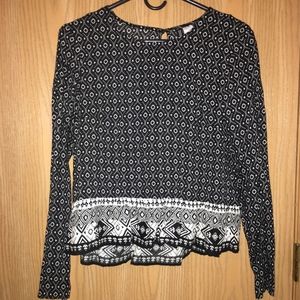 Black and white patterned long-sleeved top